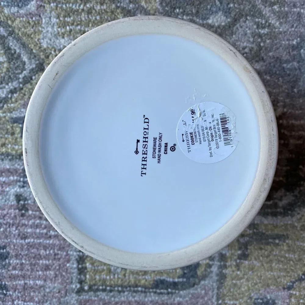 Threshold stoneware hand